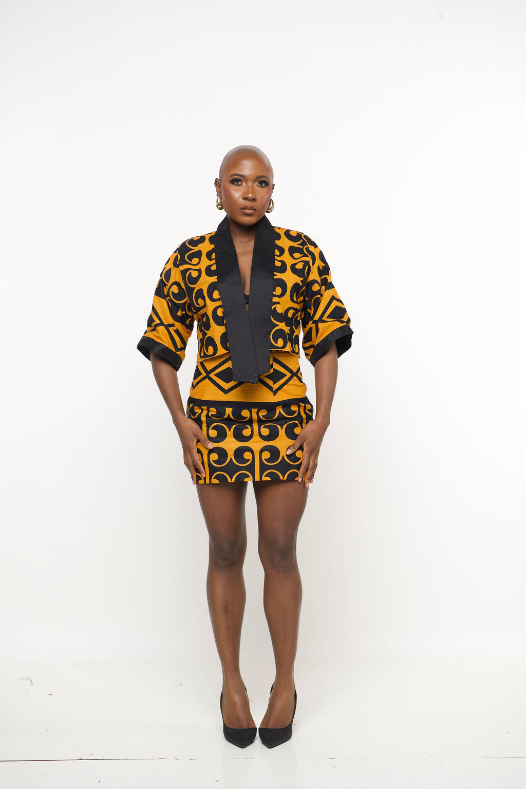 ‘Ninaa’ Gold & Black African Print Two-Piece Set – Cropped Kimono Jacket and Mini Skirt for Women