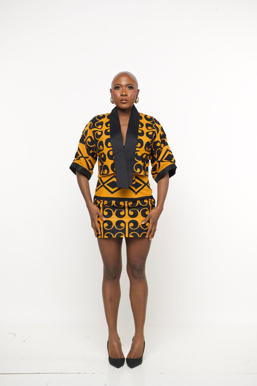 ‘Ninaa’ Gold & Black African Print Two-Piece Set – Cropped Kimono Jacket and Mini Skirt for Women